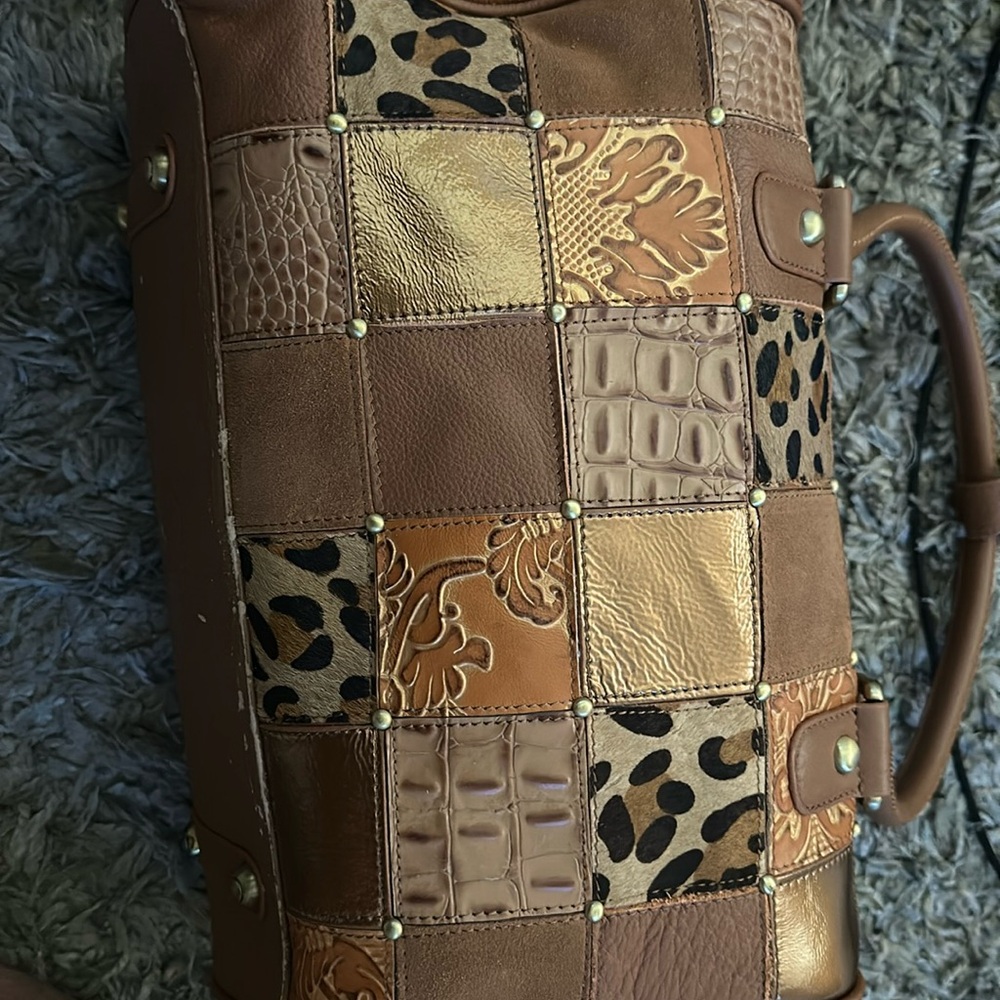 New Sharif large purse peeling at bottom